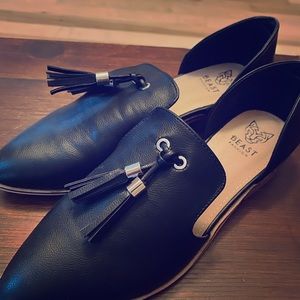 Black flats with black tassels